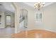 Formal dining room with hardwood floors and a chandelier at 10115 Day Lily Ct, Bradenton, FL 34212