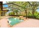 Inviting screened pool and spa with a spacious patio area at 10115 Day Lily Ct, Bradenton, FL 34212