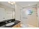 Bathroom boasts a large shower and dark vanity top at 10115 Day Lily Ct, Bradenton, FL 34212