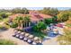 Community clubhouse with golf cart parking at 10115 Day Lily Ct, Bradenton, FL 34212