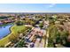 Gated entrance to a luxurious community with lush landscaping at 10115 Day Lily Ct, Bradenton, FL 34212