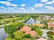 Luxury home community with lakefront properties and lush landscaping at 10115 Day Lily Ct, Bradenton, FL 34212