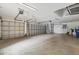 Spacious three-car garage with ample storage space at 10115 Day Lily Ct, Bradenton, FL 34212