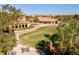 Putting green with seating area near clubhouse at 10115 Day Lily Ct, Bradenton, FL 34212