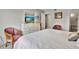 Main bedroom with king-size bed and dresser at 6157 Midnight Pass Rd # E24, Sarasota, FL 34242
