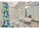 Updated bathroom with granite vanity, bathtub, and shower at 6157 Midnight Pass Rd # E24, Sarasota, FL 34242