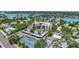 Condominium complex with tennis court and parking at 6157 Midnight Pass Rd # E24, Sarasota, FL 34242