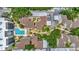 Aerial view of condo building and surrounding landscape at 6157 Midnight Pass Rd # E24, Sarasota, FL 34242