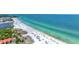 Aerial view of beach, ocean, and coastal buildings at 6157 Midnight Pass Rd # E24, Sarasota, FL 34242