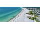 Aerial view of beach, ocean, and coastal buildings at 6157 Midnight Pass Rd # E24, Sarasota, FL 34242