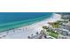 Aerial view of beach, ocean, and coastal buildings at 6157 Midnight Pass Rd # E24, Sarasota, FL 34242