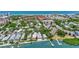 Aerial view of waterfront community with lush landscaping and beautiful homes at 6157 Midnight Pass Rd # E24, Sarasota, FL 34242
