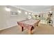 Game room featuring a pool table and comfortable seating at 6157 Midnight Pass Rd # E24, Sarasota, FL 34242