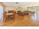 An inviting living room features hardwood floors, a fireplace, and comfortable seating for relaxation at 220 Santa Maria St # 240, Venice, FL 34285