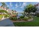 Beautiful outdoor patio with waterway views and lush landscaping; a perfect spot for relaxation at 220 Santa Maria St # 240, Venice, FL 34285
