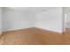 Bright bedroom features hardwood floors and white walls, creating a spacious and airy ambiance at 2226 Grove St, Sarasota, FL 34239