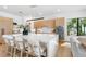 Large kitchen island with modern countertops and bar seating at 2226 Grove St, Sarasota, FL 34239
