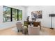 Stylish office space with modern decor, a large window, and a comfortable seating area at 2226 Grove St, Sarasota, FL 34239