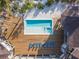 Elevated view of a pristine pool and deck area at 7147 La Lenaire Dr, Longboat Key, FL 34228