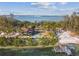 Island home with private beach, pool, and dock at 7147 La Lenaire Dr, Longboat Key, FL 34228
