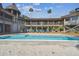 Inviting swimming pool with a large deck, ideal for relaxation and recreation at 7147 La Lenaire Dr, Longboat Key, FL 34228