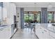 Open concept kitchen with stainless steel appliances and breakfast nook at 4811 Cabreo Ct, Lakewood Ranch, FL 34211