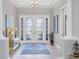 Elegant entryway with double doors and tile flooring at 4811 Cabreo Ct, Lakewood Ranch, FL 34211