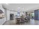 Modern kitchen featuring white cabinets and granite countertops at 4811 Cabreo Ct, Lakewood Ranch, FL 34211
