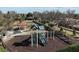 playground with play structures and shaded seating at 4811 Cabreo Ct, Lakewood Ranch, FL 34211