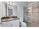 Clean bathroom with a shower/tub combo and dark vanity at 4811 Cabreo Ct, Lakewood Ranch, FL 34211