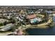 Aerial view showing community amenities including pool, tennis, and lake at 4811 Cabreo Ct, Lakewood Ranch, FL 34211
