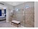 Spa-like bathroom with a large walk-in shower and bench at 4811 Cabreo Ct, Lakewood Ranch, FL 34211