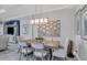 Bright dining area with modern light fixture at 4811 Cabreo Ct, Lakewood Ranch, FL 34211