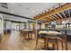 Clubhouse bar with wooden beams and comfortable seating at 4811 Cabreo Ct, Lakewood Ranch, FL 34211