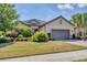 One-story home with landscaped yard at 4811 Cabreo Ct, Lakewood Ranch, FL 34211