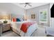 Bright bedroom with a comfortable king-size bed and neutral decor at 4811 Cabreo Ct, Lakewood Ranch, FL 34211