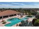 Large community pool with surrounding lounge chairs at 4811 Cabreo Ct, Lakewood Ranch, FL 34211