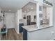 Updated kitchen with granite countertops and stainless steel appliances at 220 Santa Maria St # 240, Venice, FL 34285