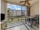 Bright dining area with table and chairs, overlooking a courtyard at 220 Santa Maria St # 240, Venice, FL 34285