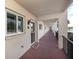 Clean condo hallway with access to individual units at 220 Santa Maria St # 240, Venice, FL 34285