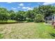 Backyard with pond view and lush vegetation at 4701 50Th W Ave, Bradenton, FL 34210