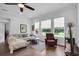 Relaxing living room with sectional sofa, armchair, and hardwood floors at 4701 50Th W Ave, Bradenton, FL 34210