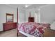 Bedroom with a post bed and dresser at 4701 50Th W Ave, Bradenton, FL 34210