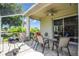 Relaxing screened patio with seating area and ceiling fan at 4701 50Th W Ave, Bradenton, FL 34210