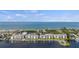 Oceanfront condo building with private boat docks and pool at 8911 Midnight Pass Rd # 511, Sarasota, FL 34242