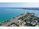 An aerial view showcasing a house's location near a bridge and waterfront at 121 Seagull Ln, Sarasota, FL 34236