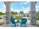 Relaxing balcony with chairs and a beautiful view at 121 Seagull Ln, Sarasota, FL 34236