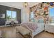 Bright bedroom with a stylish bed and personal workspace at 121 Seagull Ln, Sarasota, FL 34236