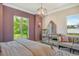 Spacious bedroom with large windows and sitting area at 121 Seagull Ln, Sarasota, FL 34236
