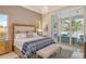 Spacious bedroom with king-size bed and ocean views at 121 Seagull Ln, Sarasota, FL 34236